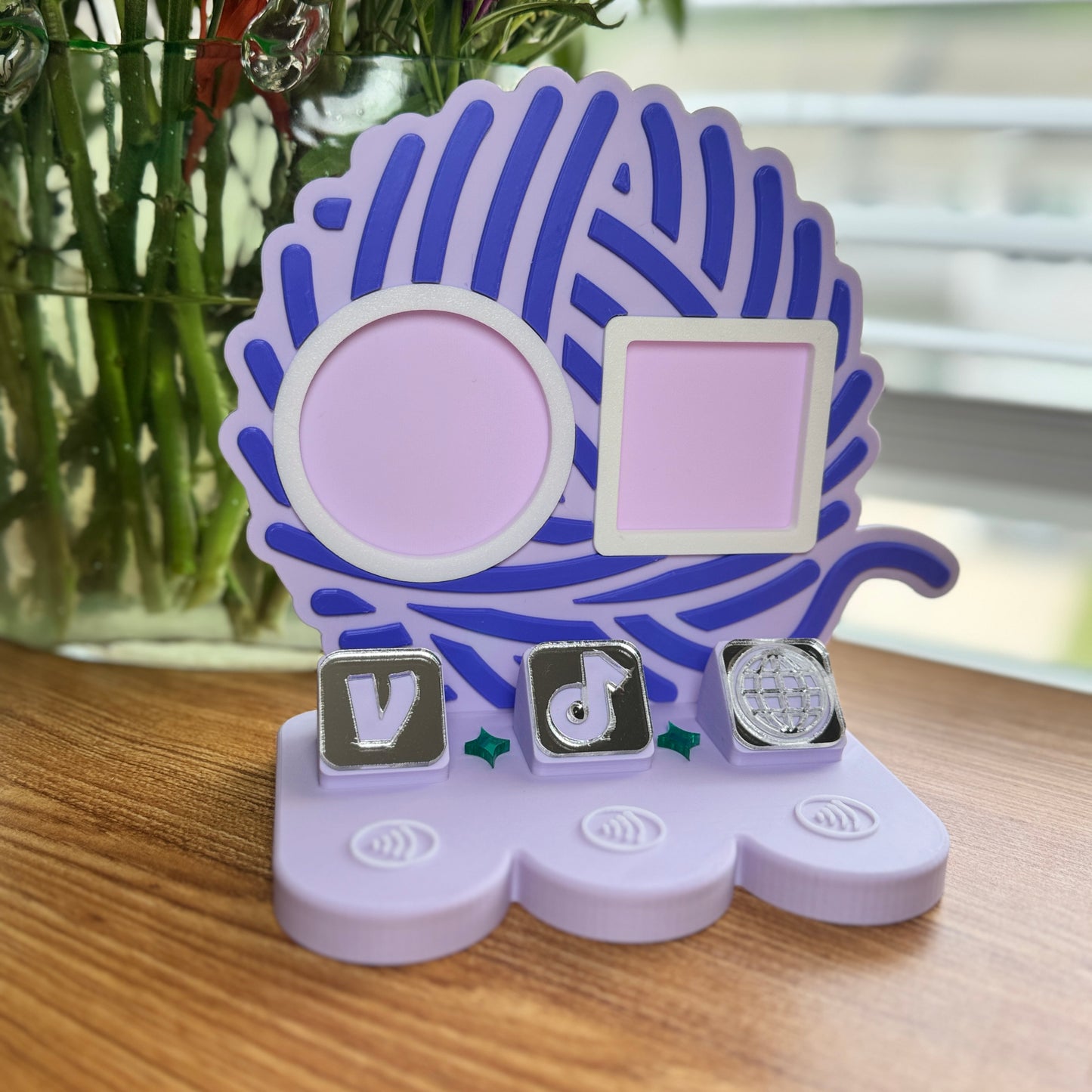 Pastel yarn-shaped 3D printed payment sign for vendors with social icons